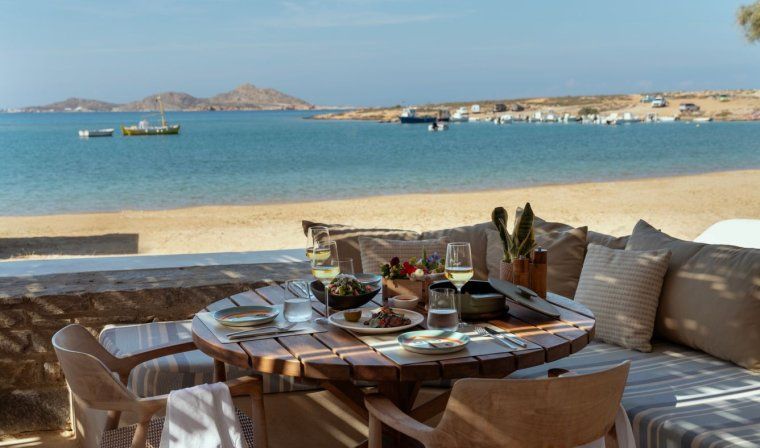 View of luxury lunch by the beach at Cosme in Greece