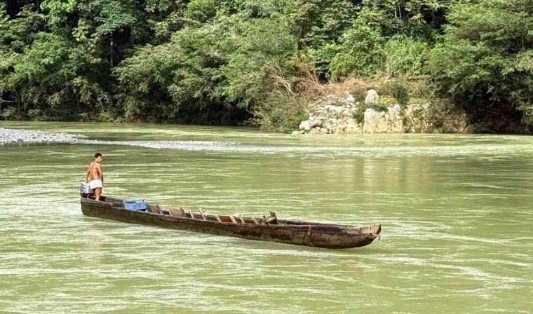 View of Embera person in traditional canoe in Panama during luxury tour