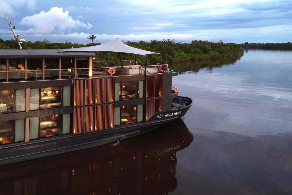 The Aqua Nera luxury boat cruising down the river in the Peruvian Amazon