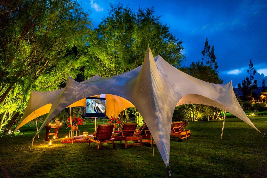 Outdoor movie and dining in a private tent at Rio Sagrado in the Sacred Valley