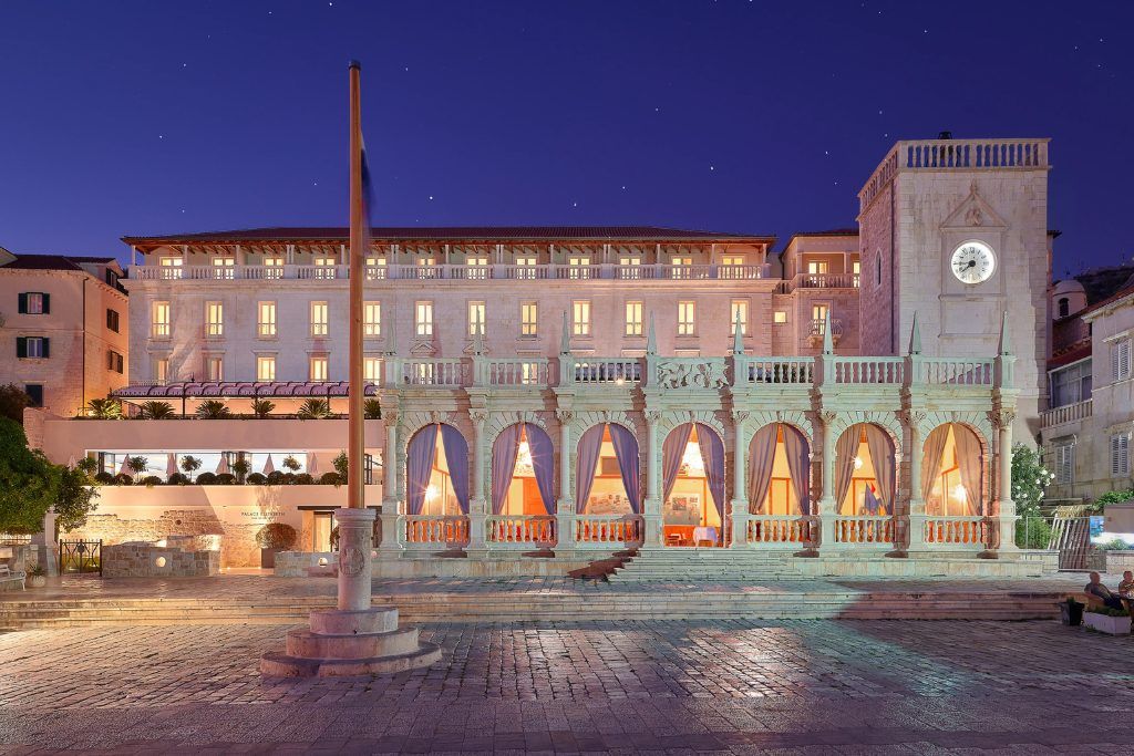 The exterior of the Palace Elisabeth at night.