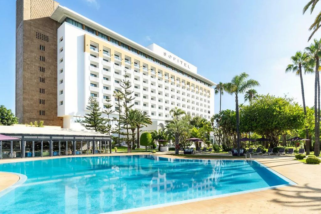 The swimming pool and exterior of the Sofitel Rabat Jardin des Roses.