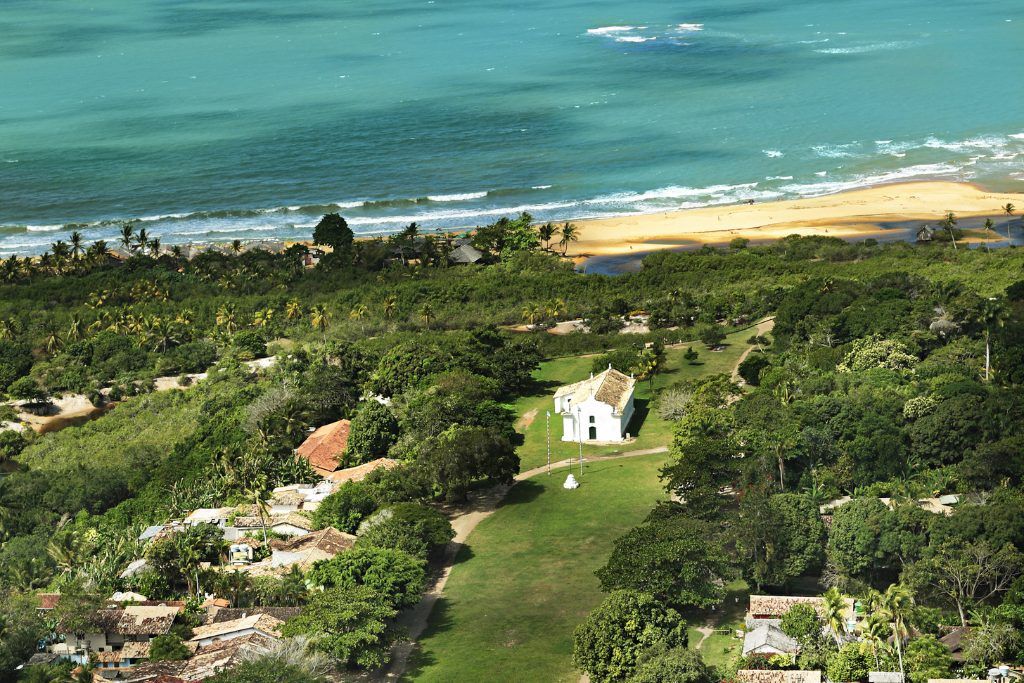 View of the beach and property of UAXA Casa Hotel in Trancoso.