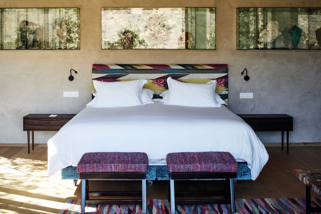 A view of the bed in one of the rooms at Vik Chile.