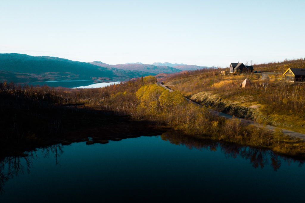 A view of Skaret Lodge overlooking the water.