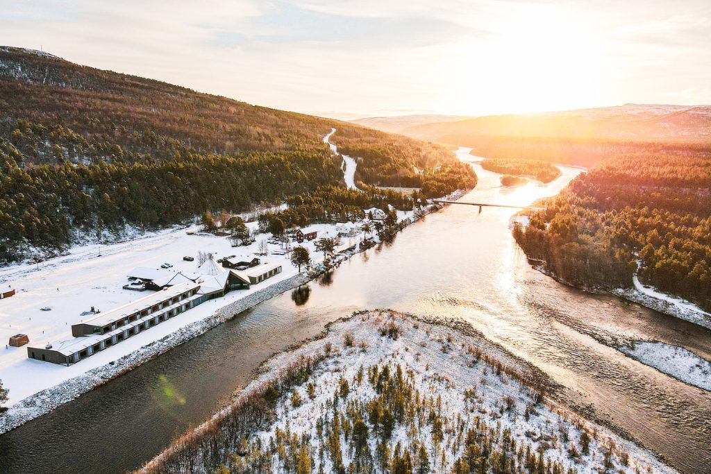 An aerial view of Sorrisniva Arctic Wilderness Lodge in the winter.
