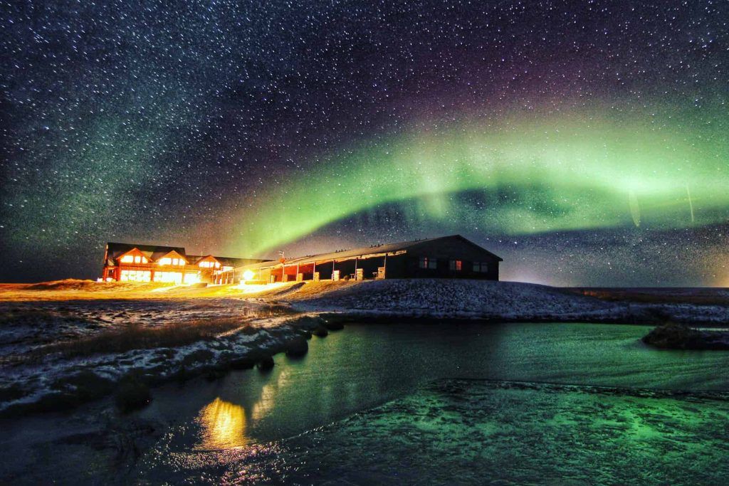 The Northern Lights and stars above Hotel Rangá.