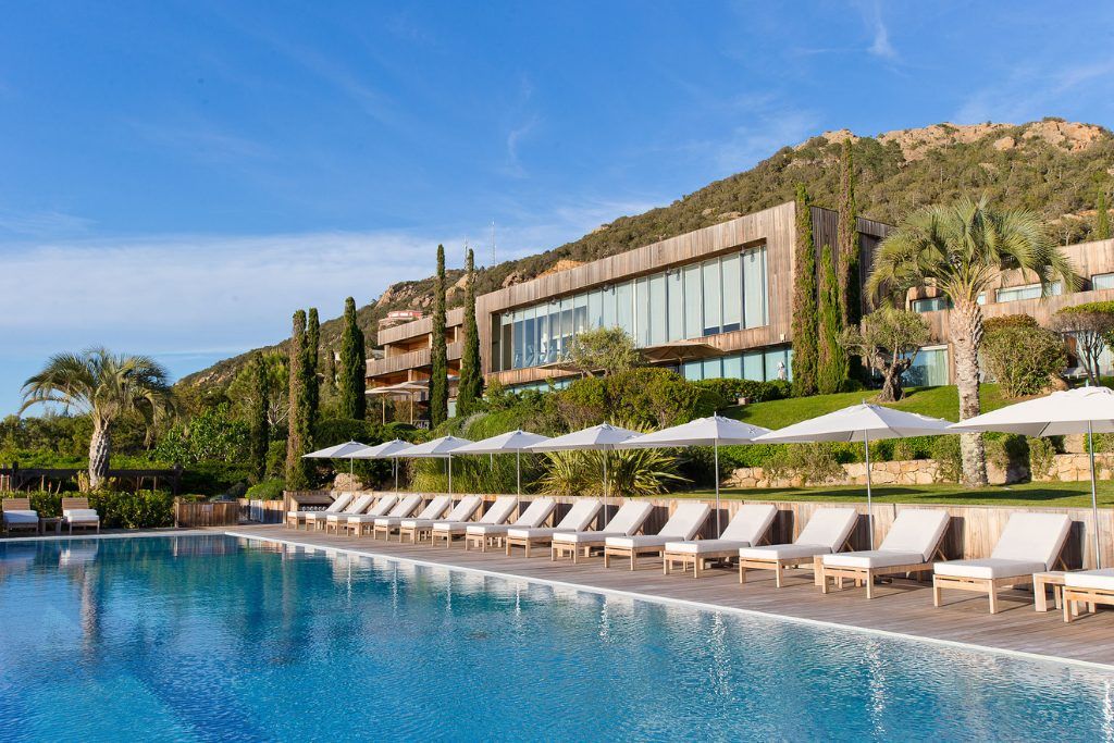 The swimming pool and facade of Casadelmar in Porto Vecchio.