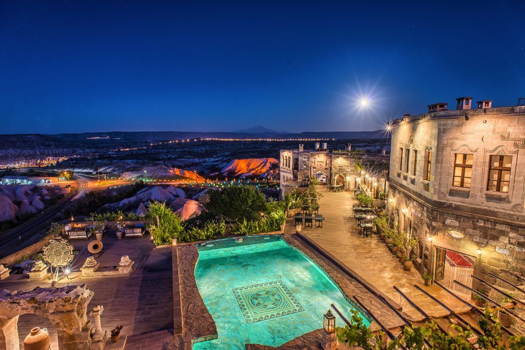 An evening, aerial view of the swimming pool at Museum Hotel in Cappadocia.