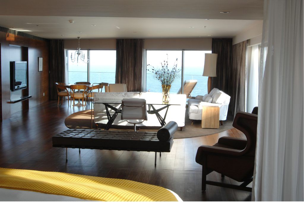 The living area in one room overlooking the ocean at Hotel Fasano Rio.