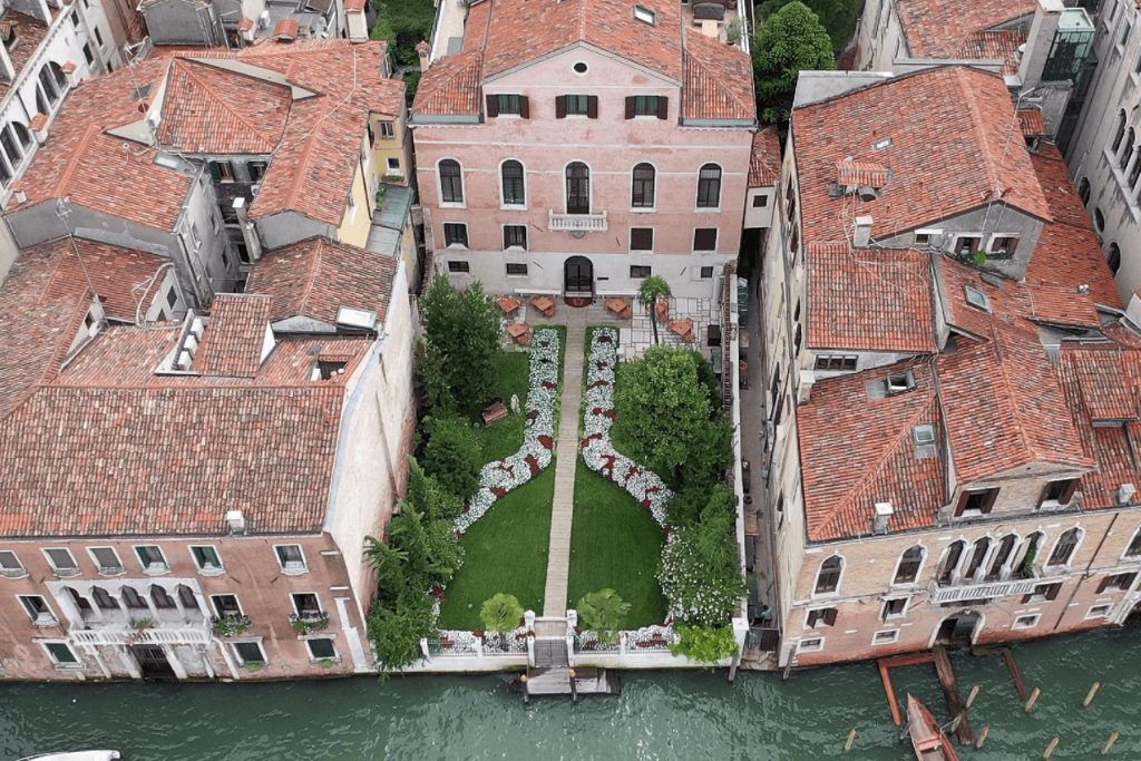 An aerial shot of the Palazzo Venart and its central garden.