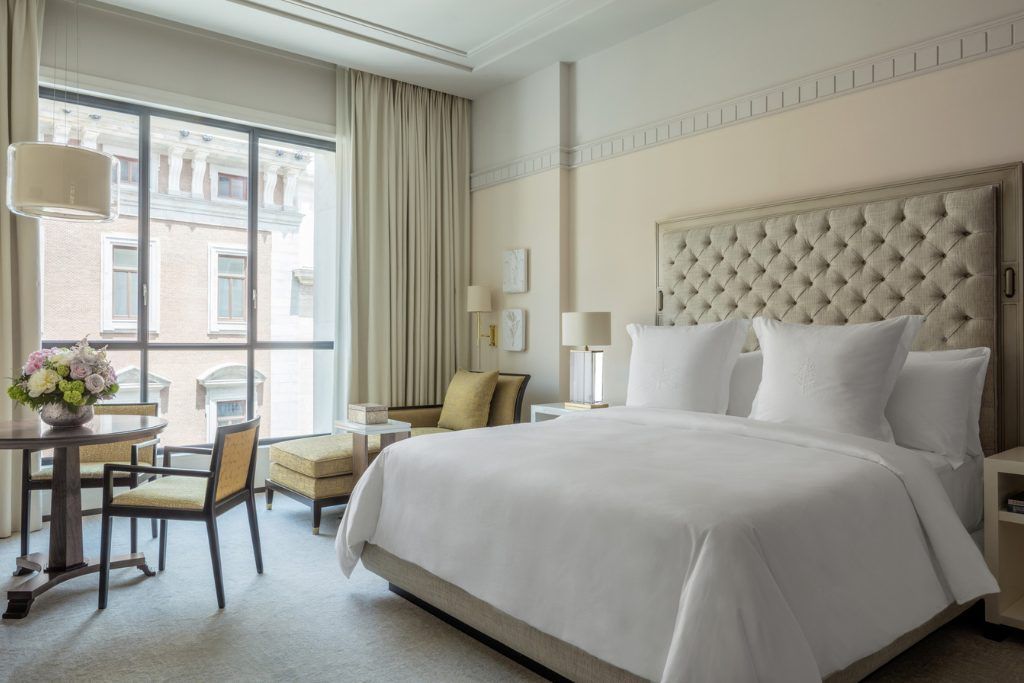 One of the clean rooms with white accents in the Four Seasons Madrid.