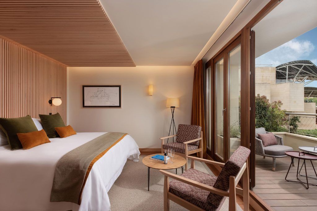 The warm interior of one of the rooms at Hotel Marques de Riscal.