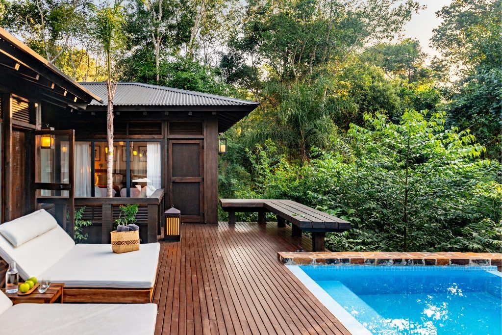The swimming pool and loungers at Awasi Iguazu.