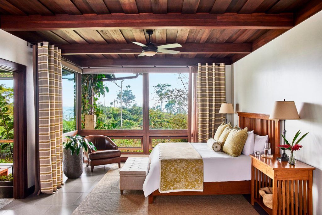 One of the sunny rooms at Hacienda Alta Gracia with wooden accents.