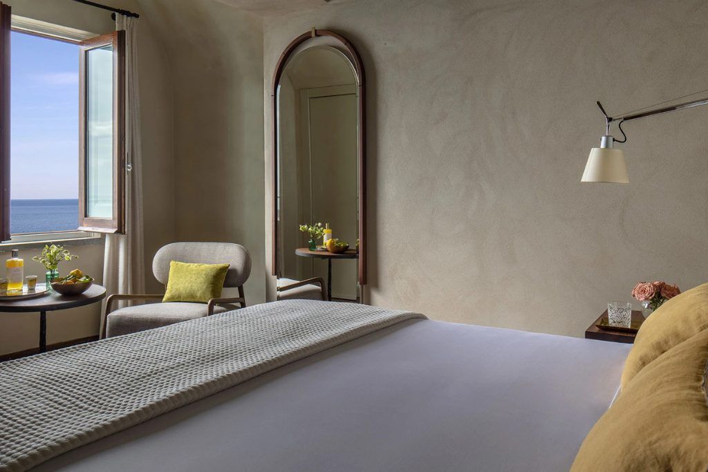 One of the beds in the Anantara Convento di Amalfi Grand Hotel.