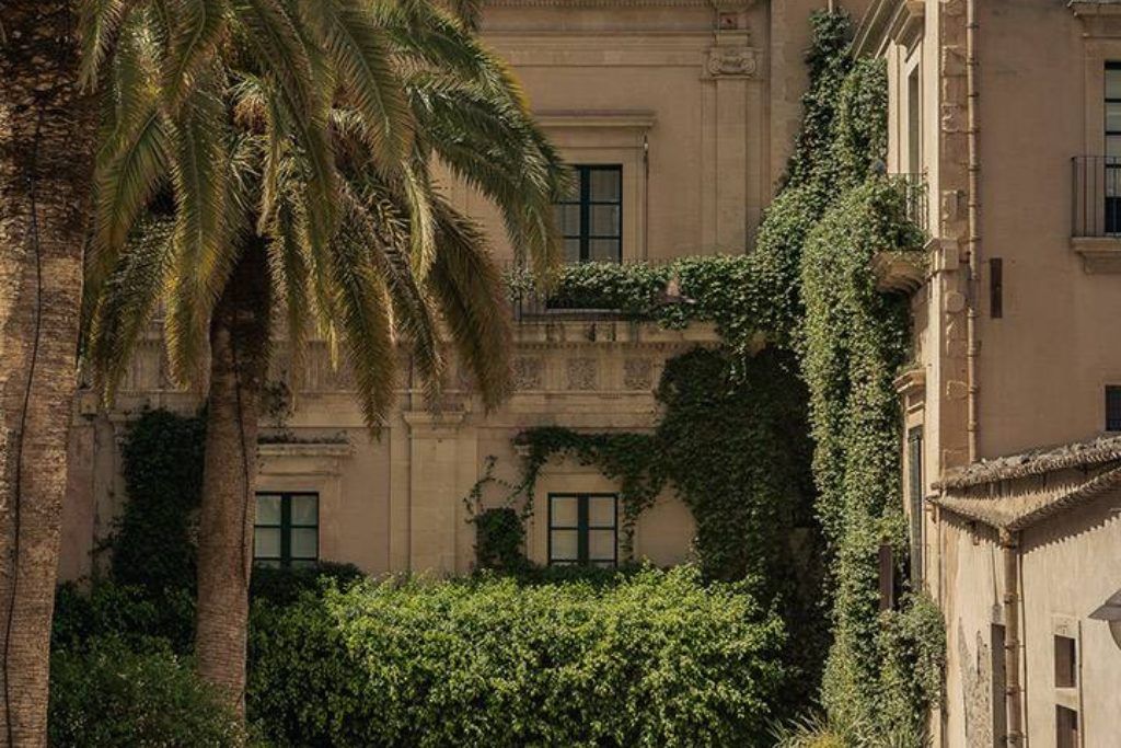 The inner courtyard and exterior of the Seven Rooms Villadorata.