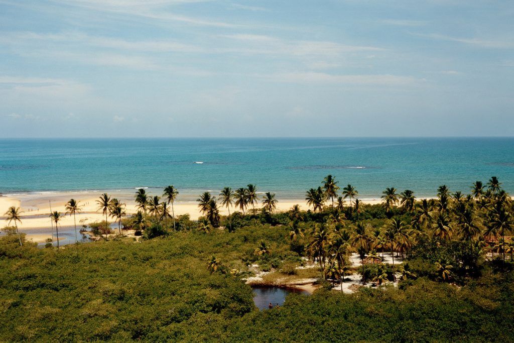 An aerial view of the beach at UAXA Casa Hotel in Trancoso.