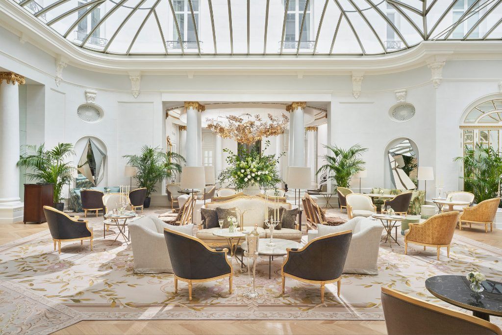 The lobby of the Mandarin Oriental Ritz with sofas and a coffee table.