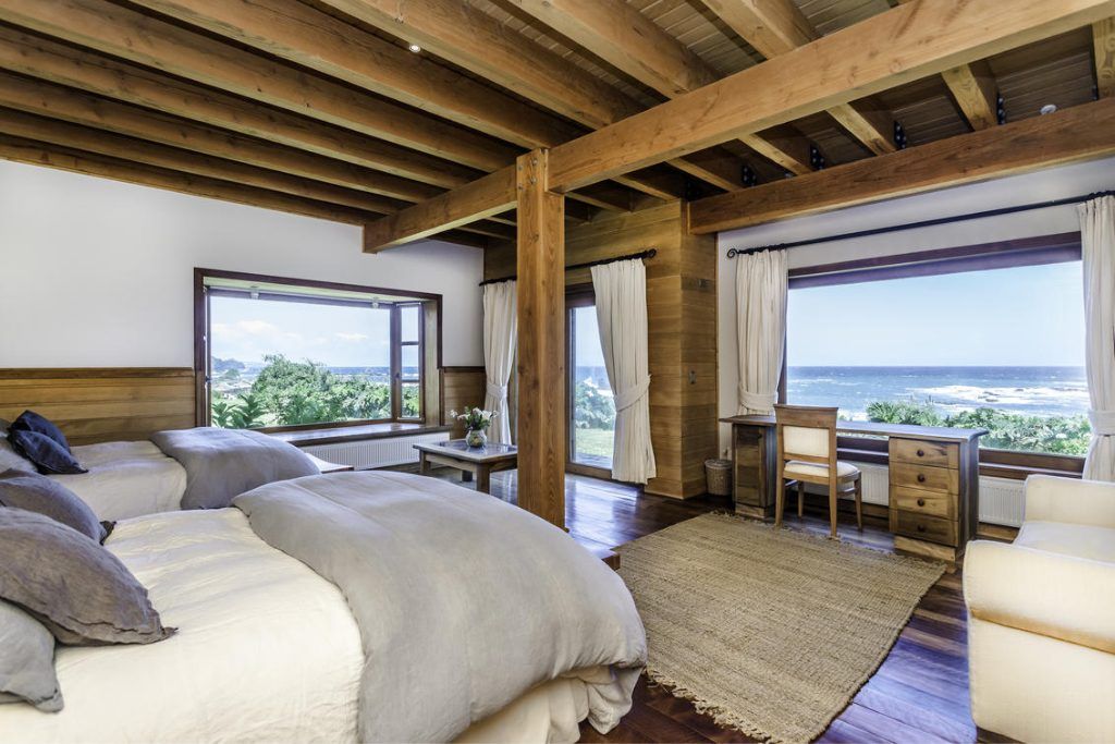 One of the bright rooms at Mari Mari with views of the ocean.