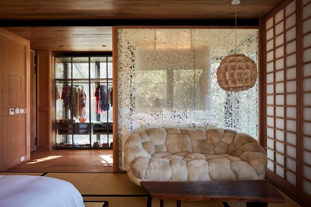 The lounge and closet in one of the rooms at Vik Chile.