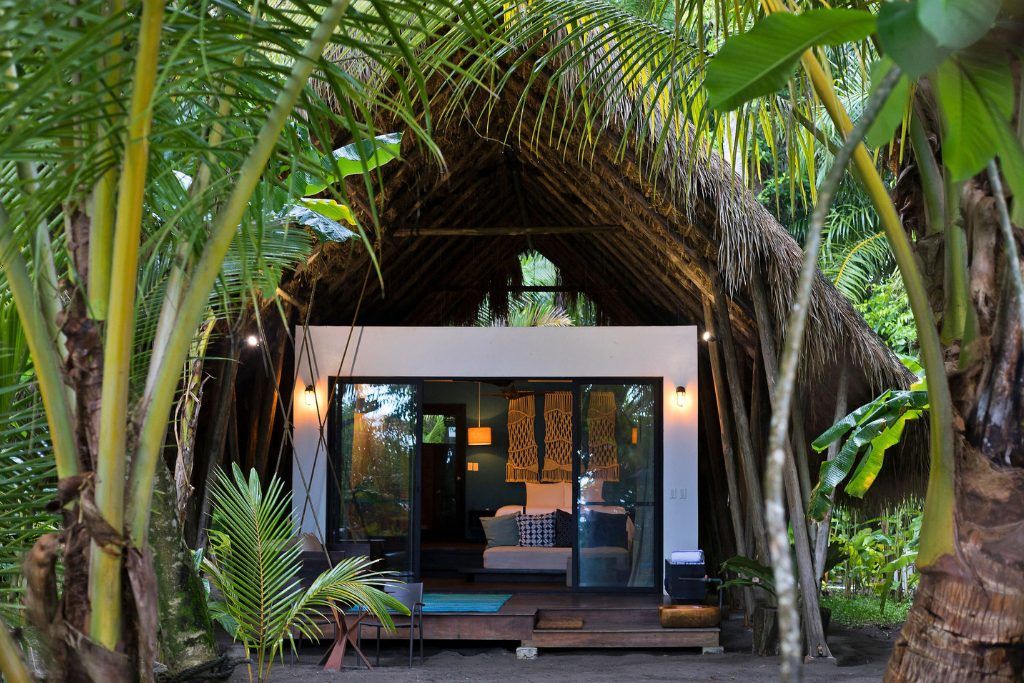 An exterior view of one of the bungalows on Isla Palenque.