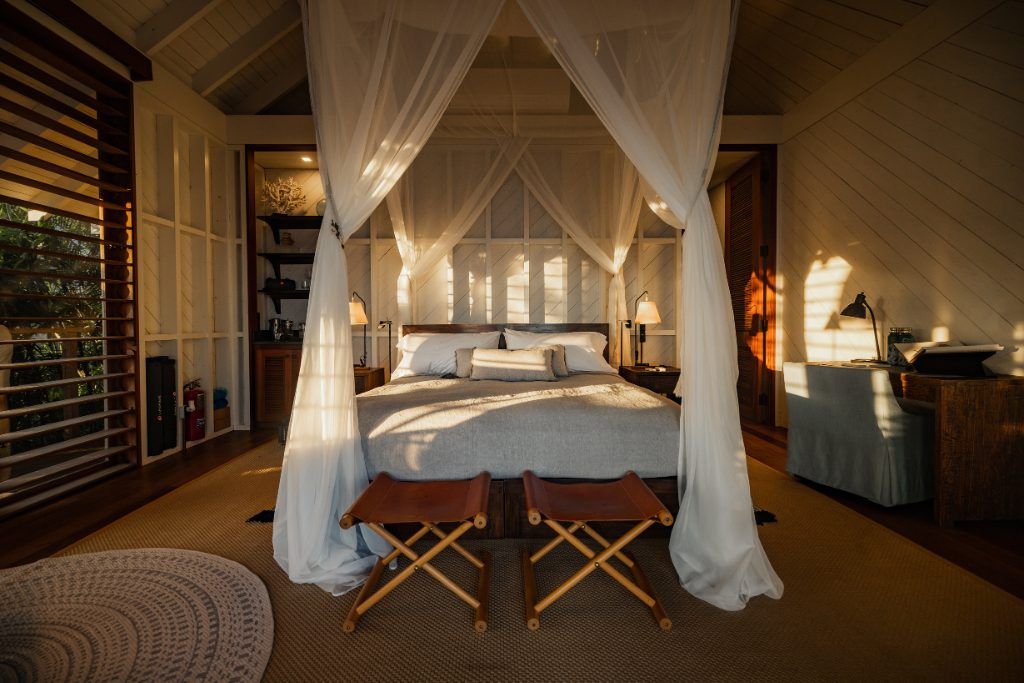 A view of the canopy-covered bed in one of the private rooms on Islas Secas.