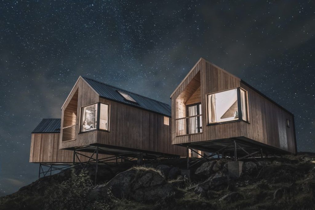 An exterior view of two of the cabins at the Hattvika Lodge.