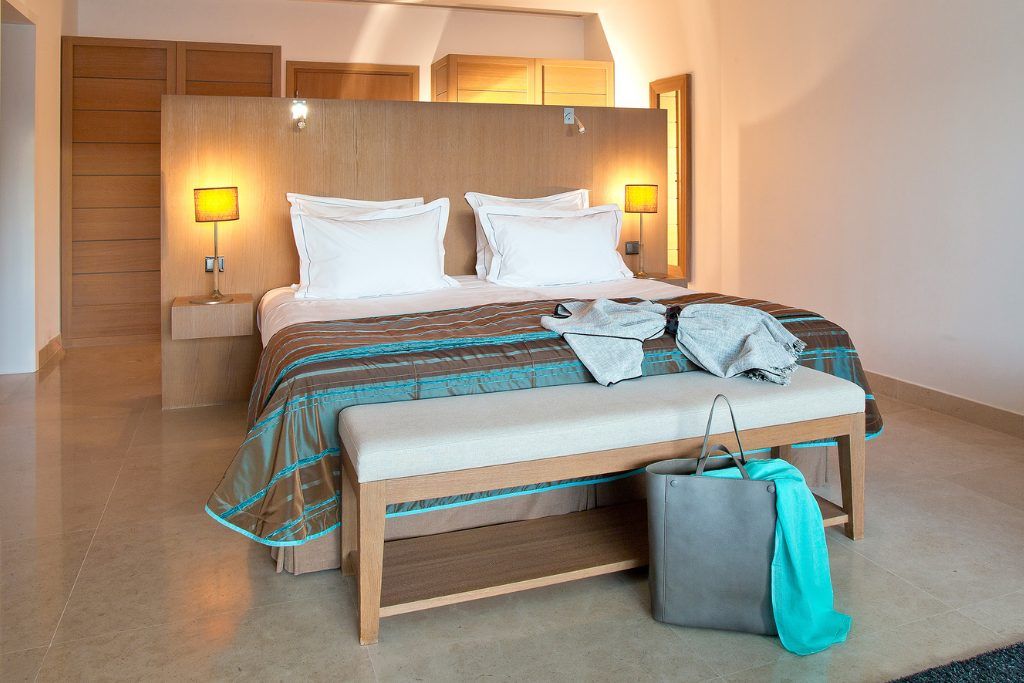 The bed in one of the rooms at Casadelmar at Porto Vecchio.