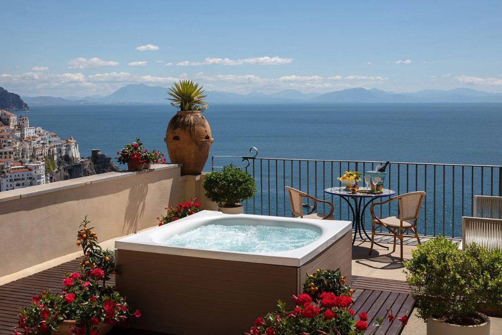 A private jacuzzi on a patio at Anantara Convento di Amalfi Grand Hotel.