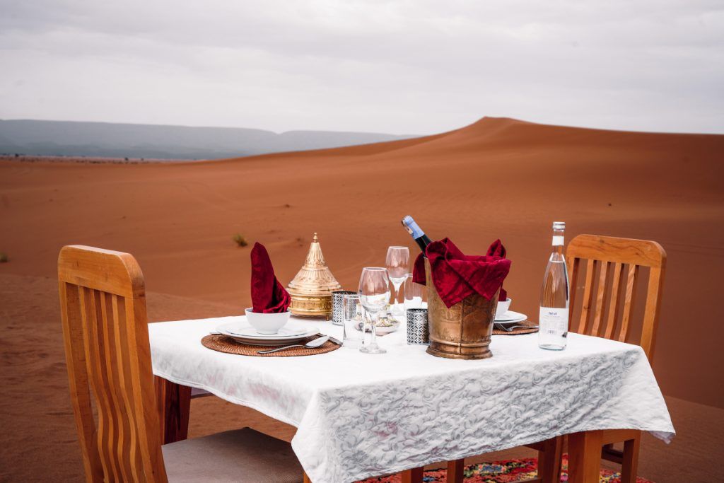 A dinner in the Sahara Desert at Private Desert Camp.