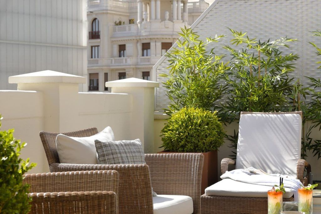 A balcony patio area at Hotel Urso in Madrid.