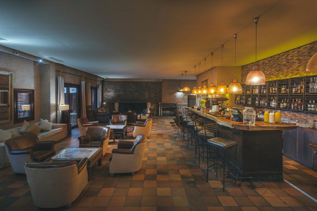 The lounge and bar in Nayara Alto Atacama.