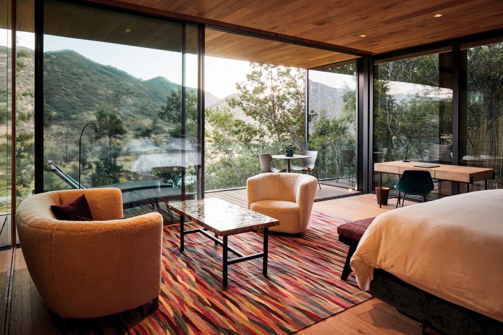 The patio overlooking the lake and mountain at Vik Chile.