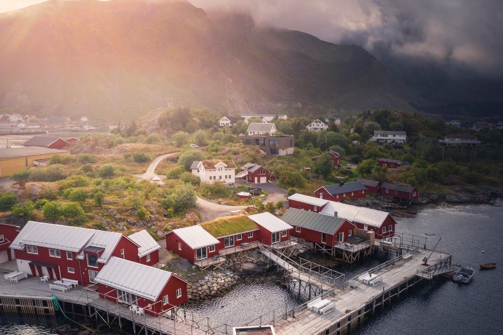 An aerial view of the red buildings at Hattvika Lodge.