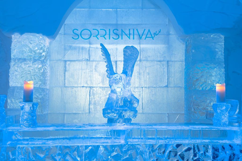 The ice bar with a sculpture on it at Sorrnisva Igloo Hotel.