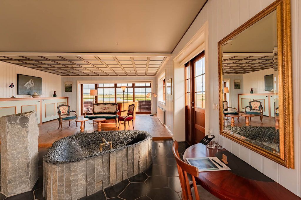 An indoor tub in a living space in one of Hotel Rangá's rooms.