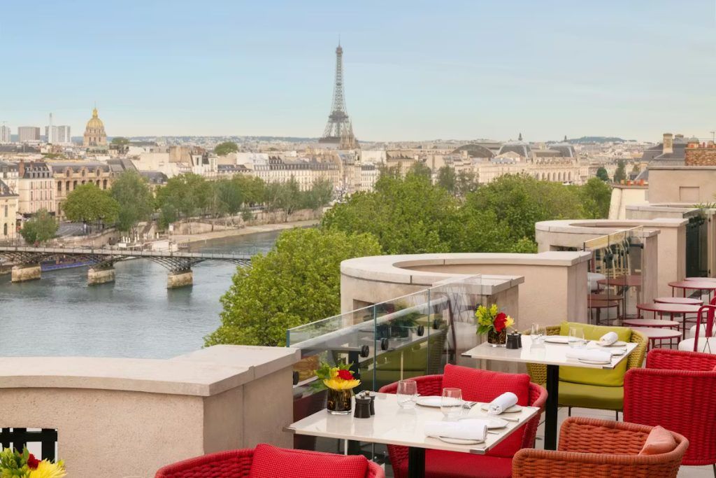 The rooftop patio at Cheval Blanc with views of the Eiffel Tower.