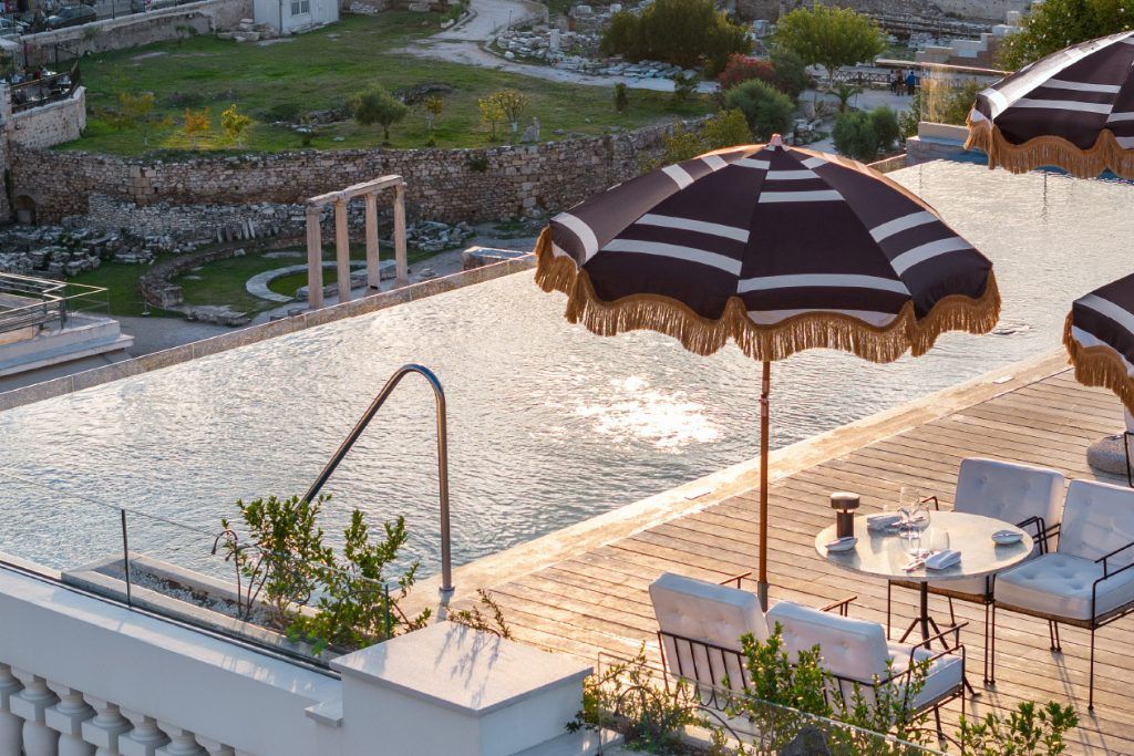 The outdoor swimming pool at The Dolli Hotel.