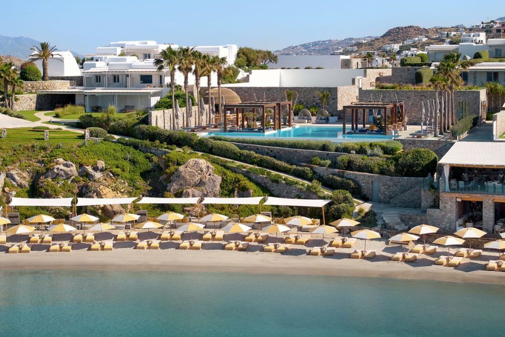 The private beach with loungers and umbrellas at the Santa Marina in Mykonos.