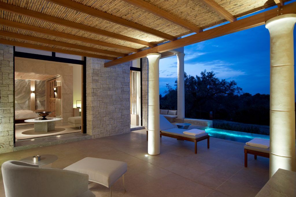 A patio with a private plunge pool at the Amanzoe.