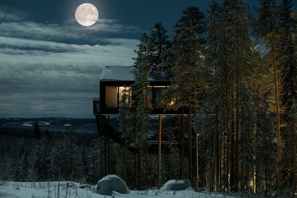 A full moon over one of the Treehotel cabins in Swedish Lapland.