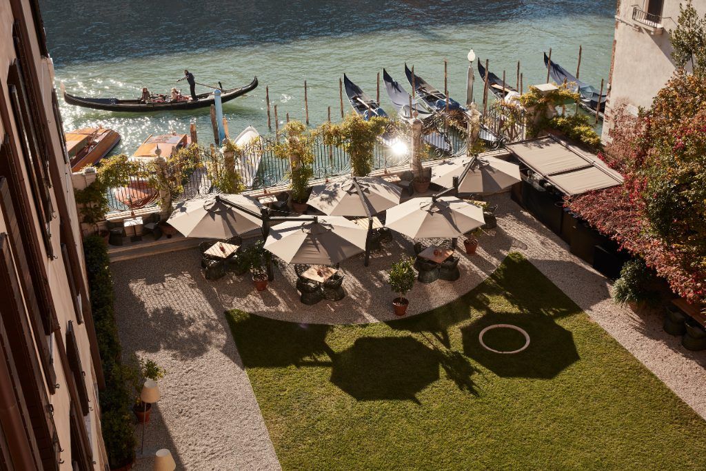 A view of the private garden along the canal at the Aman Venice.