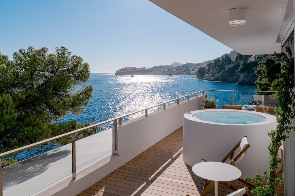 A patio with a private jacuzzi at Villa Dubrovnik.