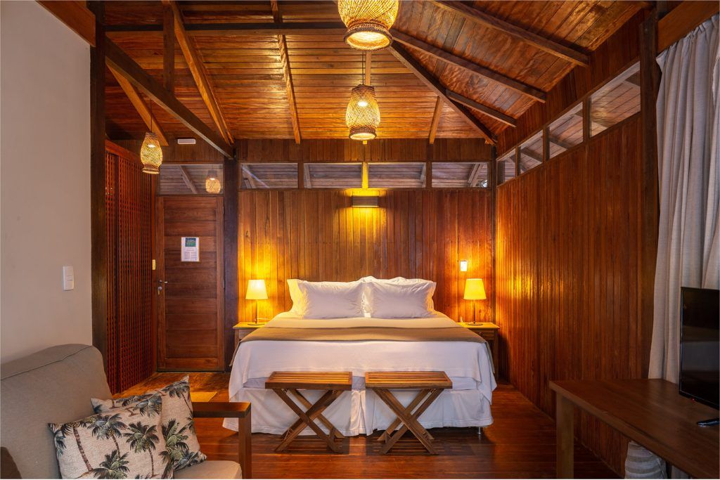 A view of the bed in one of the bungalows in Anavilhanas Jungle Lodge.