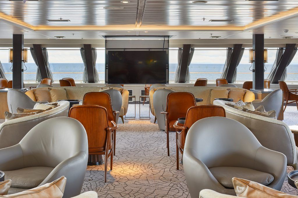 The lounge area with windows on the Magellan Explorer.