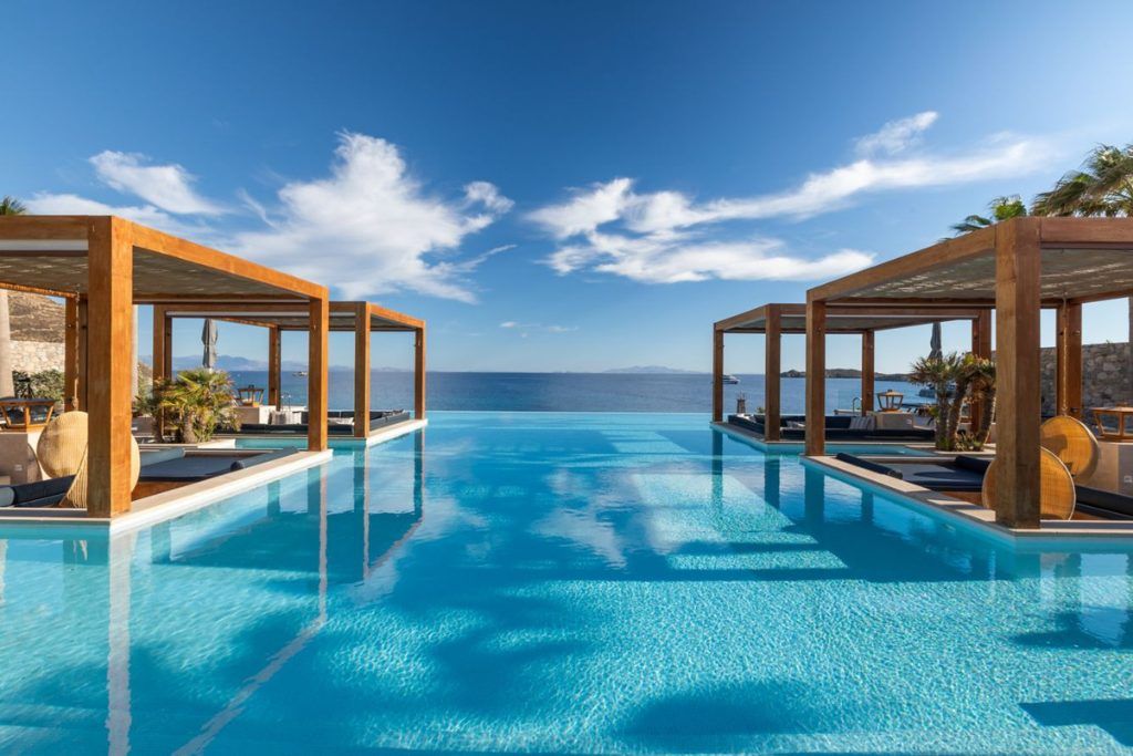 The outdoor infinity pool with loungers at the Santa Marina in Mykonos.