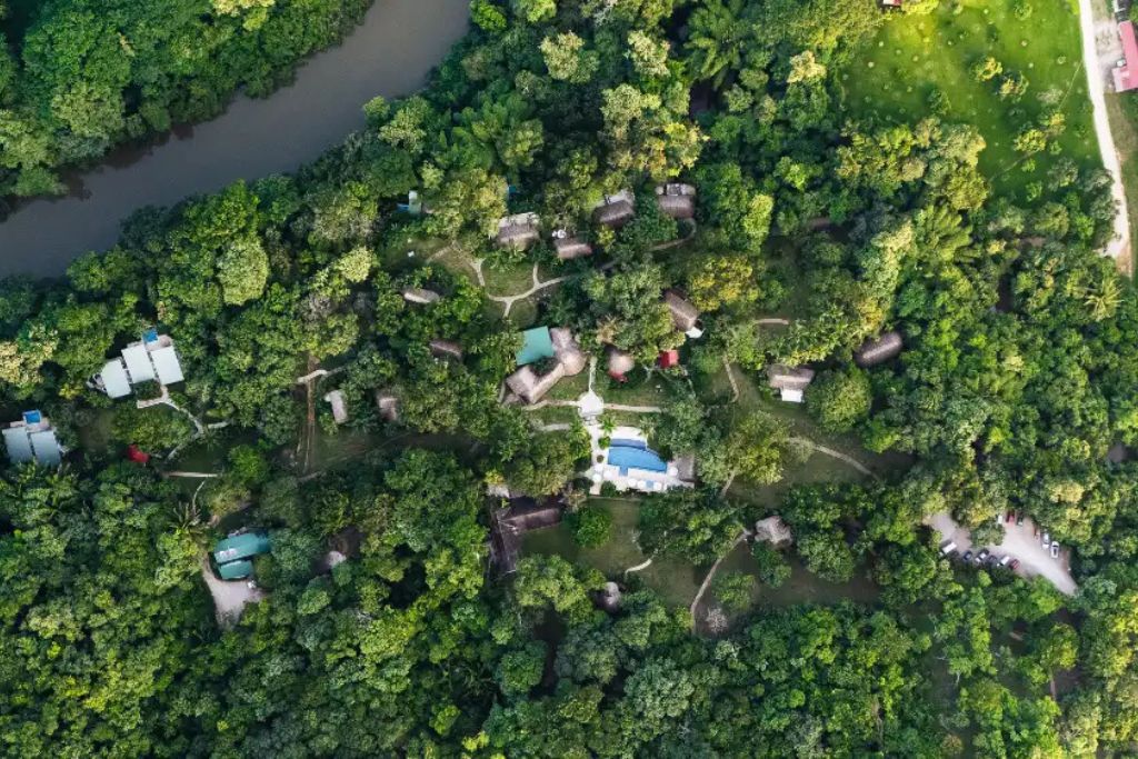 Aerial view of Chaa Creek nestled in the jungles of Belize's Maya Mountains