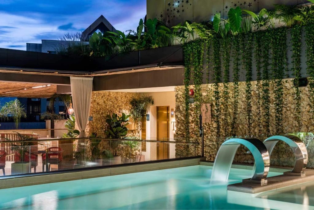 View of outdoor swimming pool at the luxury Elcielo hotel