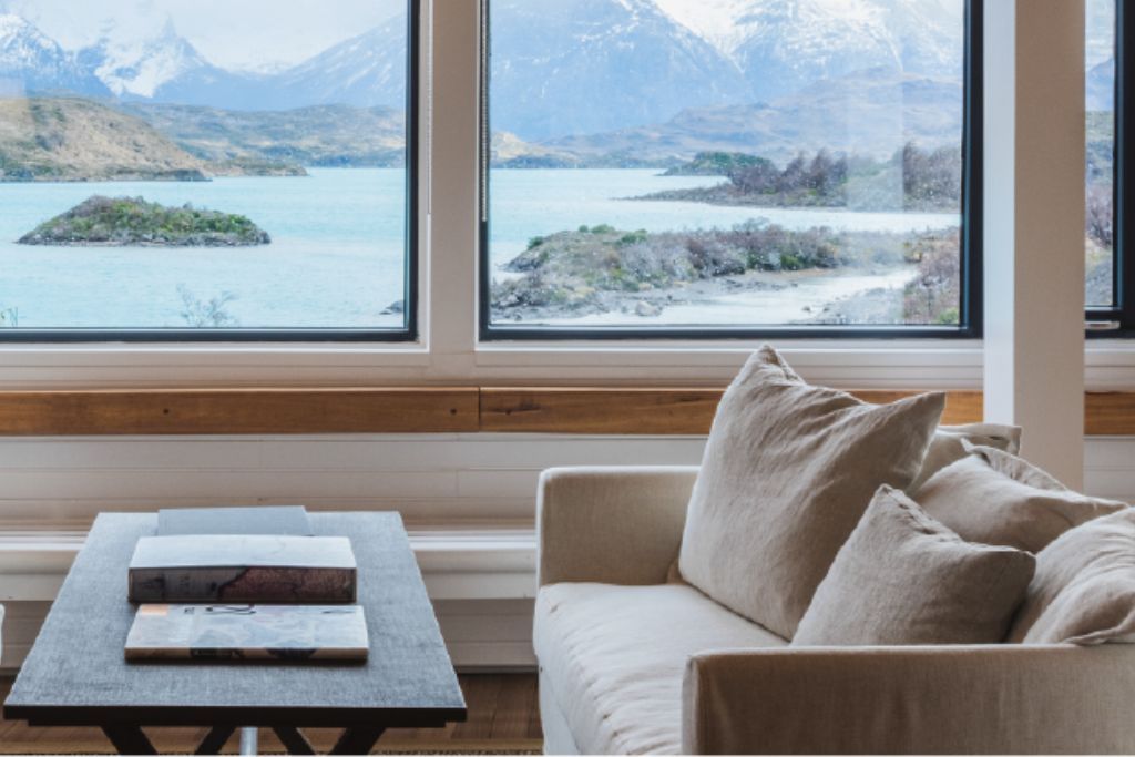 View of Torres del Paine from living area of the luxury Explora lodge